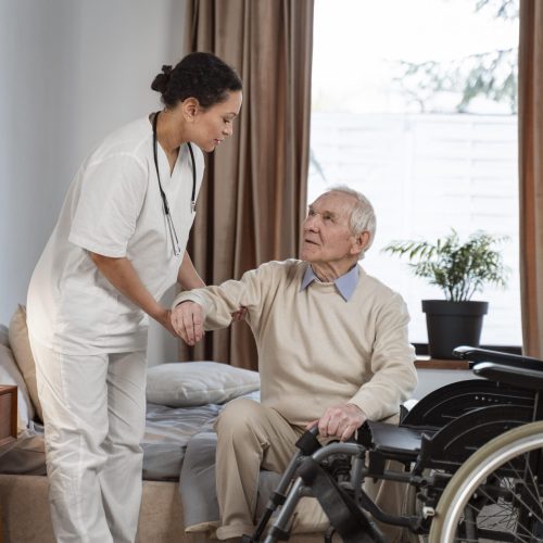 doctor-helping-senior-patient